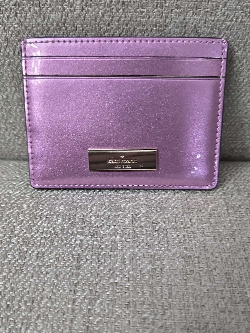 EUC Kate Spade Kenzie Metallic Lavender Card Case with Silver Plaque